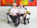 Joy (right) and Jim (left) sitting together and smiling