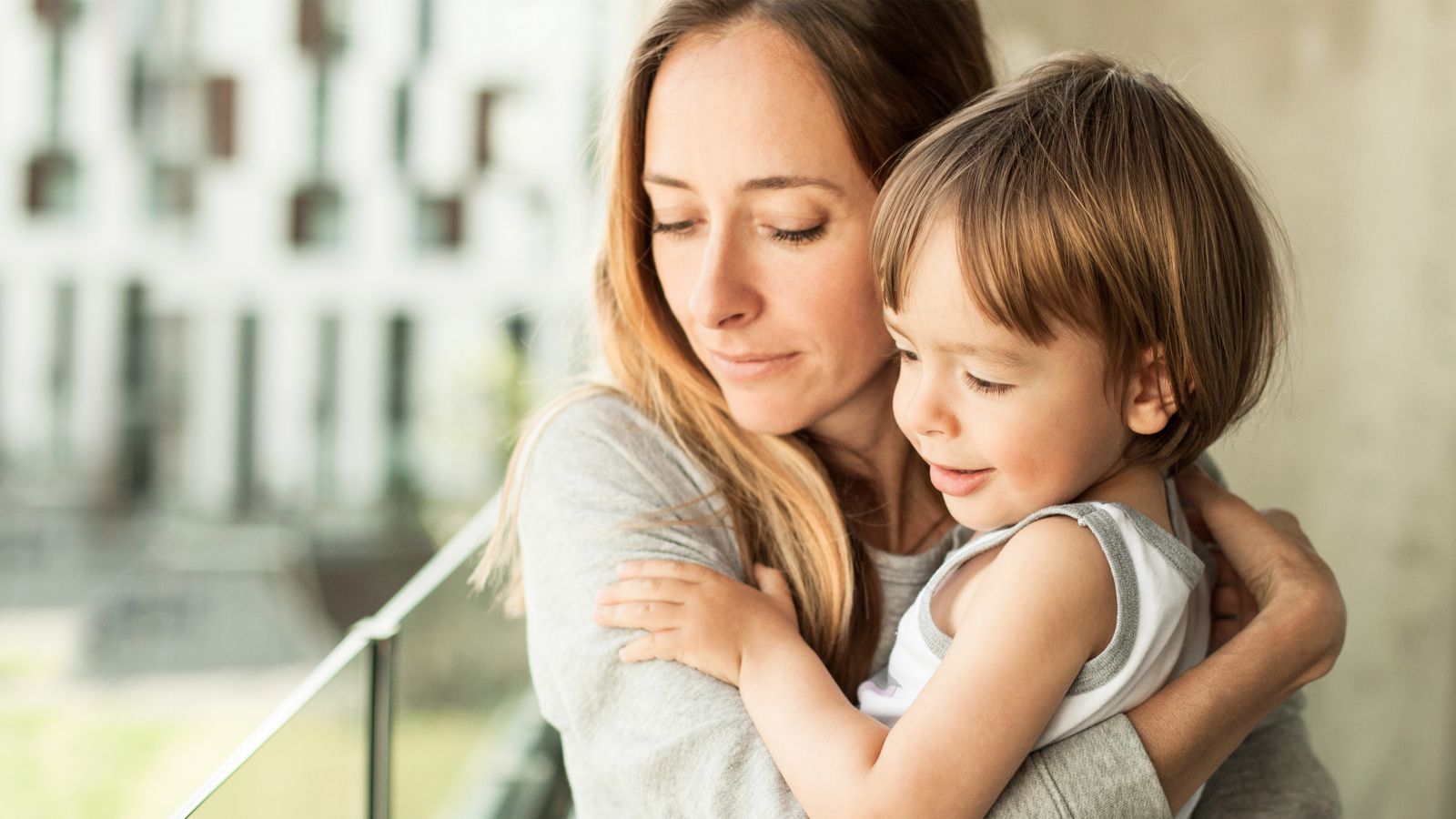 mother holding child