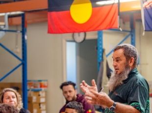 Person explaining how to celebrate NAIDOC week 