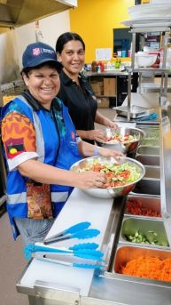 Shirli (front) and her daughter spent Christmas caring for flood-affected community members