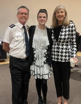 Bridget in a photo with Roger Phillips