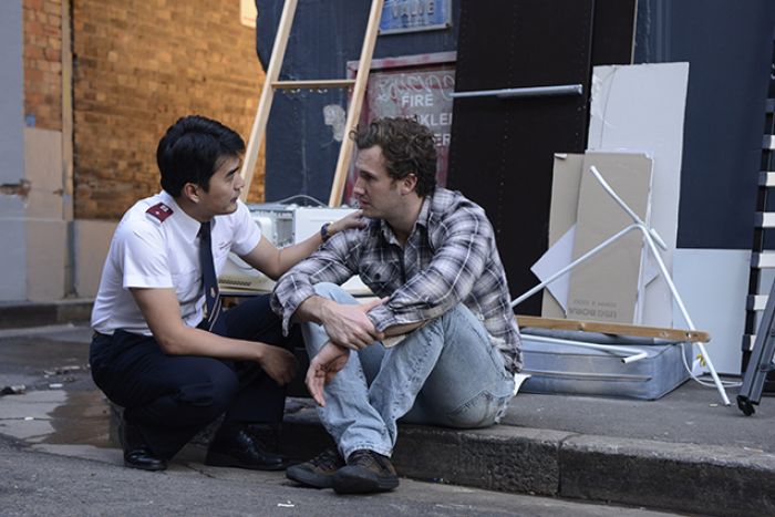 Salvation Army officer helping a young man find homelessness accommodation